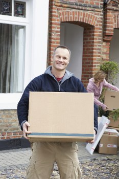 Professional movers handling office relocation in Queens Park