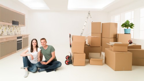 Family unpacking in their new home